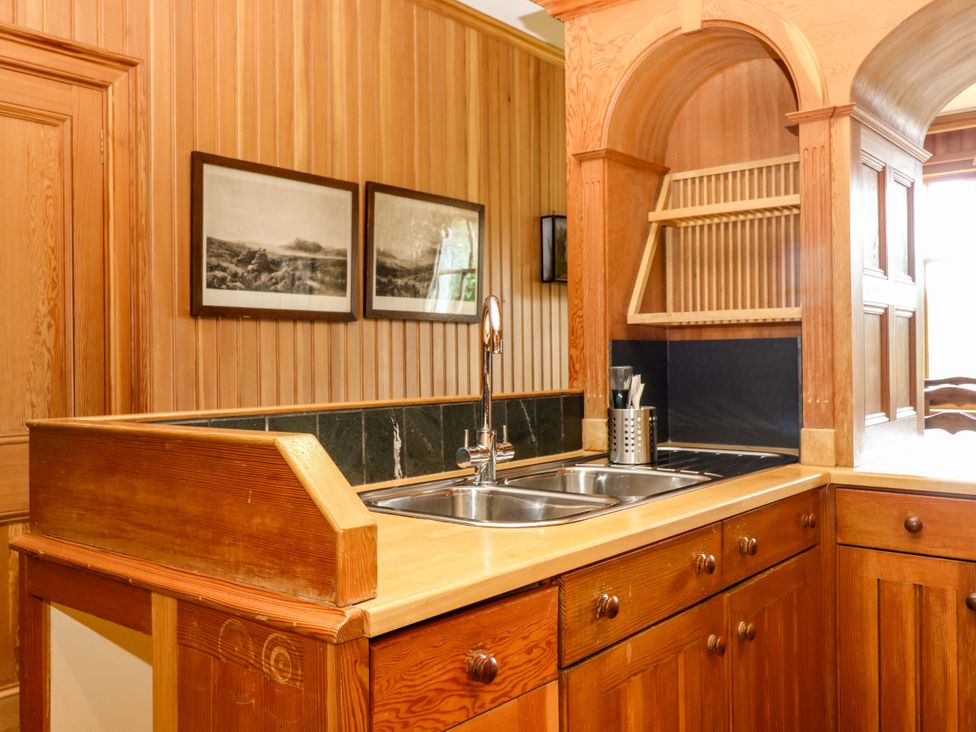 A kitchen with sink and cabinets at Creag Bhalg near Mar Lodge near Braemar