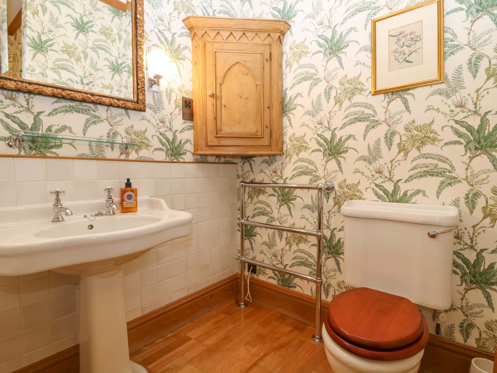 A bathroom with a sink and toilet at Creag Bhalg near Braemar