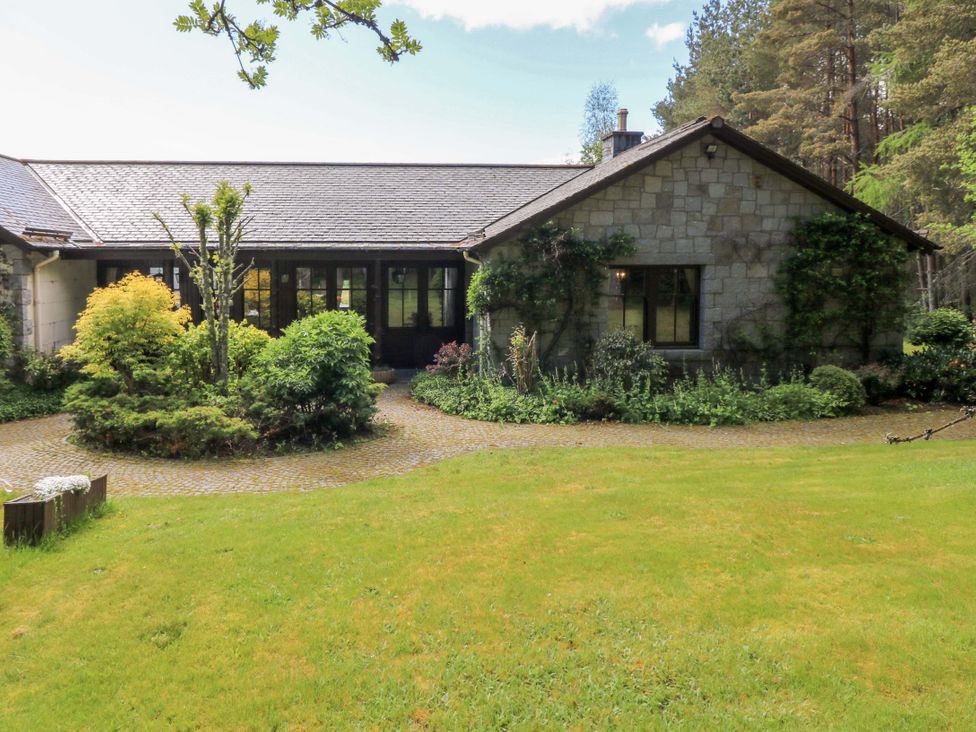 A house with a garden and pathway at Creag Bhalg near Mar Lodge near Braemar