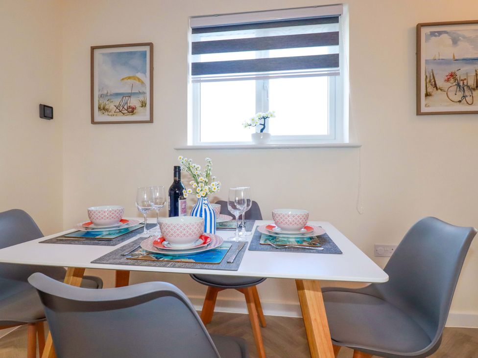 A dining room setup with table and chairs at 1 Vetch Avenue St Austell