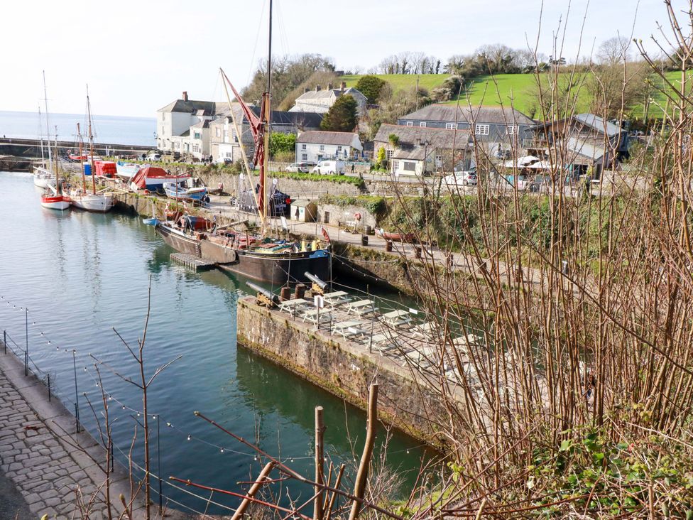 A harbor with boats and buildings at 1 Vetch Avenue St Austell
