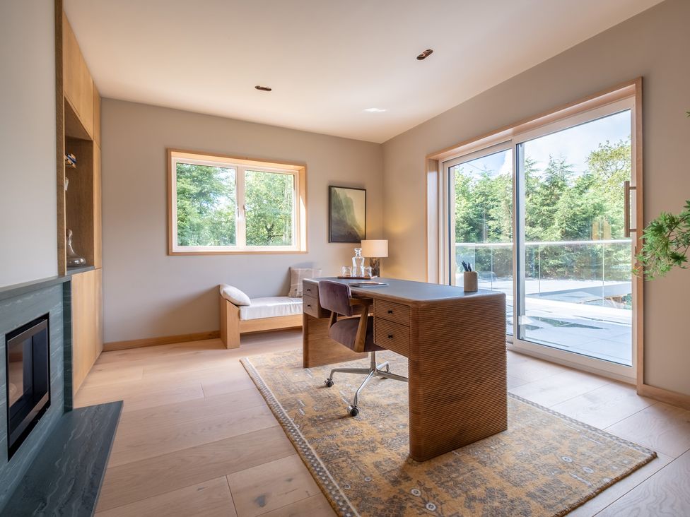 An office with a desk and a chair at Deer Close in Coniston