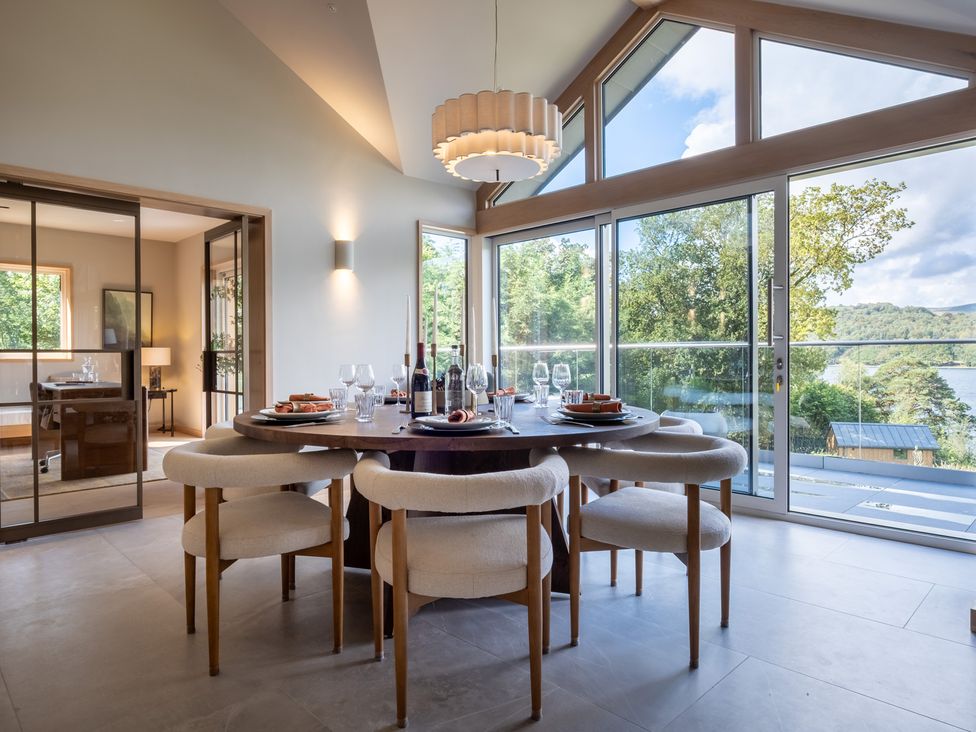 A dining room with a table and chairs at Deer Close in Coniston