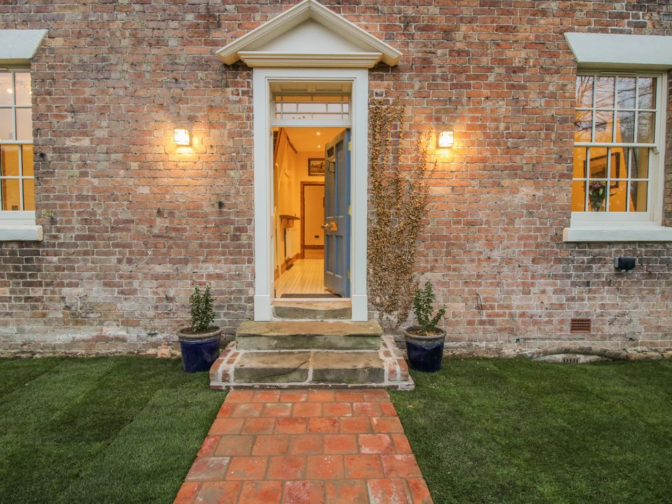 An entrance with a door and steps at Highfields Farm Church Preen near Much Wenlock