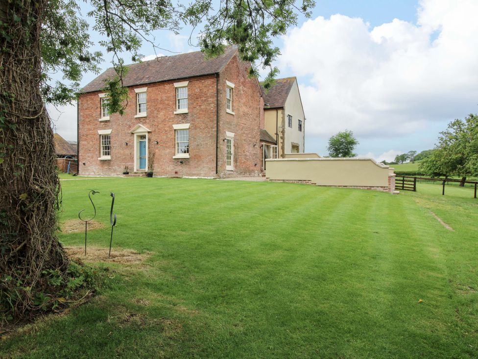 A house with a large lawn at Highfields Farm Church Preen near Much Wenlock