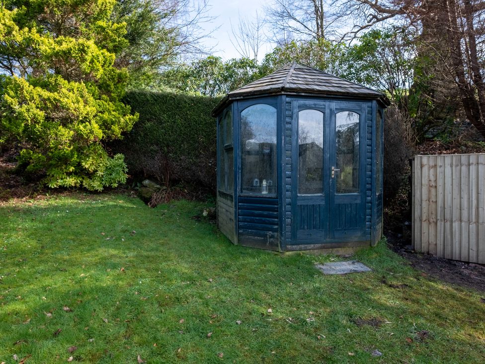 A gazebo in a garden at Marina View in Bowness-On-Windermere