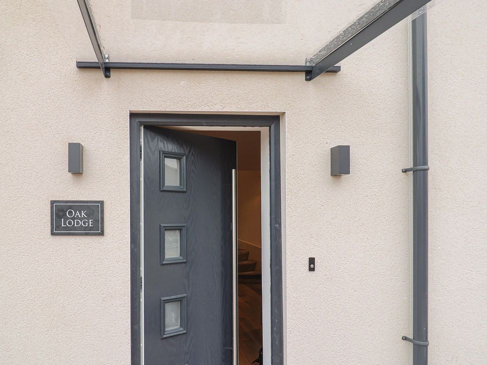 An entrance with an open door at Oak Lodge in Westonzoyland nr. Bridgwater
