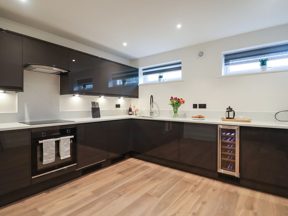 A kitchen with modern fixtures and appliances at Oak lodge Westonzoyland nr. Bridgwater