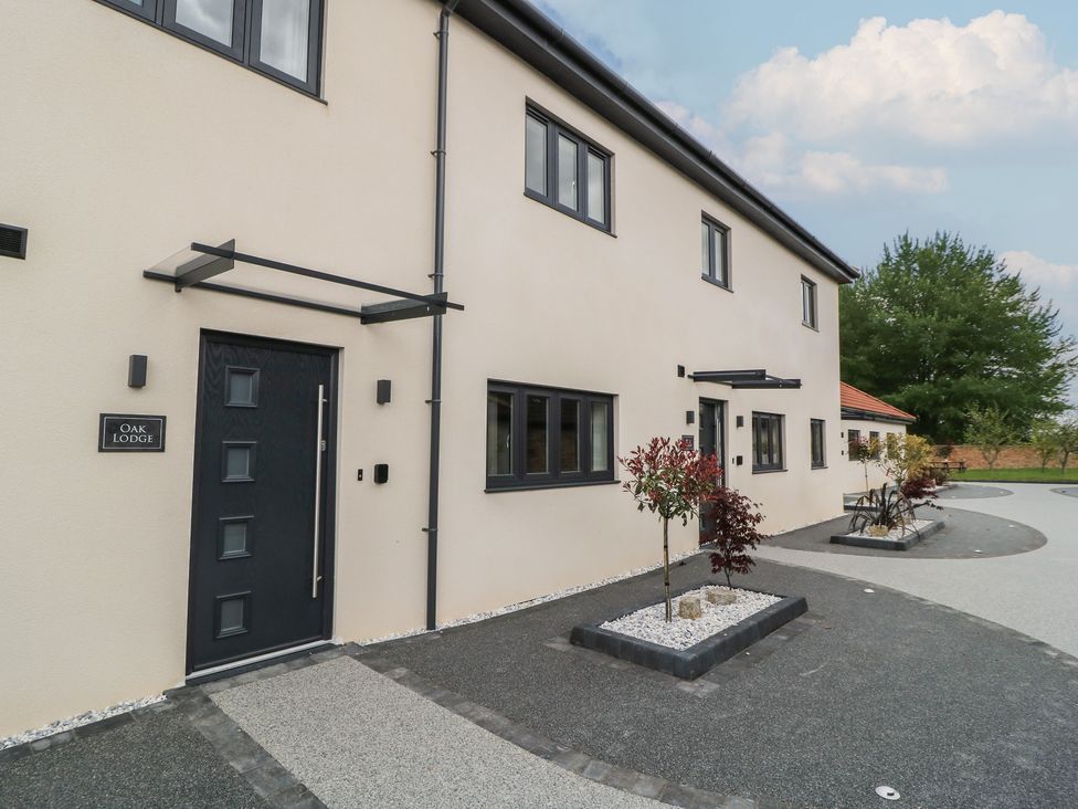 A building exterior with entrance and windows at Oak Lodge Westonzoyland nr. Bridgwater
