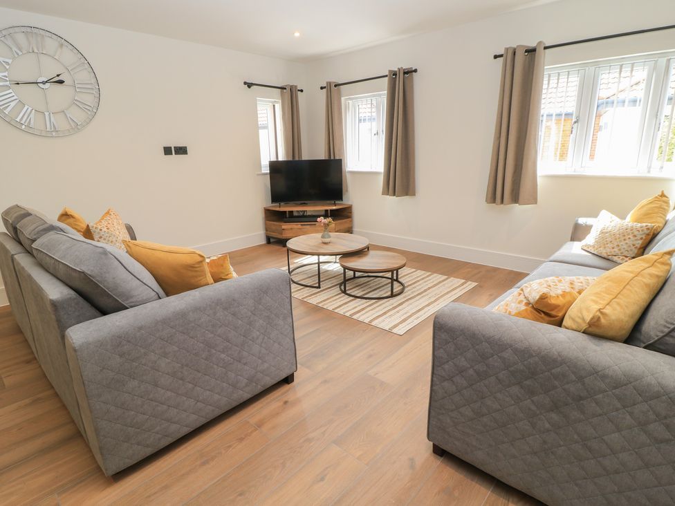 A living room with a sofa and coffee table at Pine Lodge Westonzoyland nr. Bridgwater