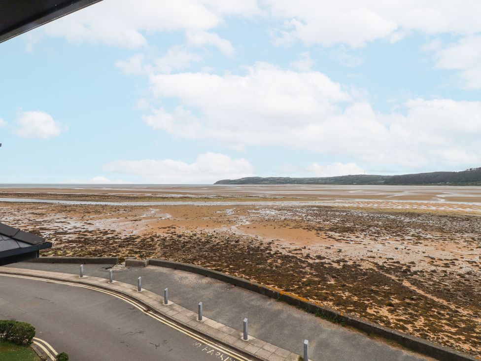 A view of the sea and shore area at 2 The Quay Pentraeth