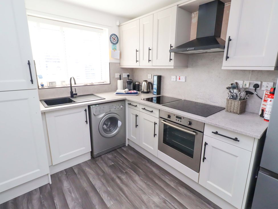 A kitchen with appliances and features at Sea Shore in Seahouses