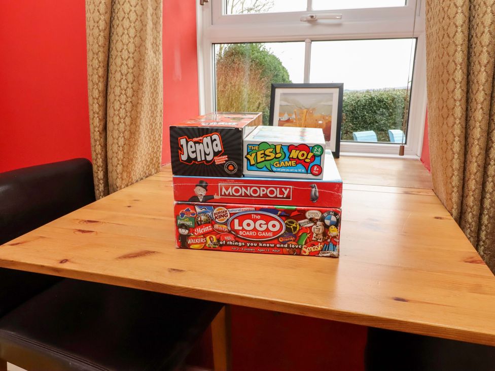 A collection of board games on a table at Petty Knowes Cottage, Rochester near Otterburn