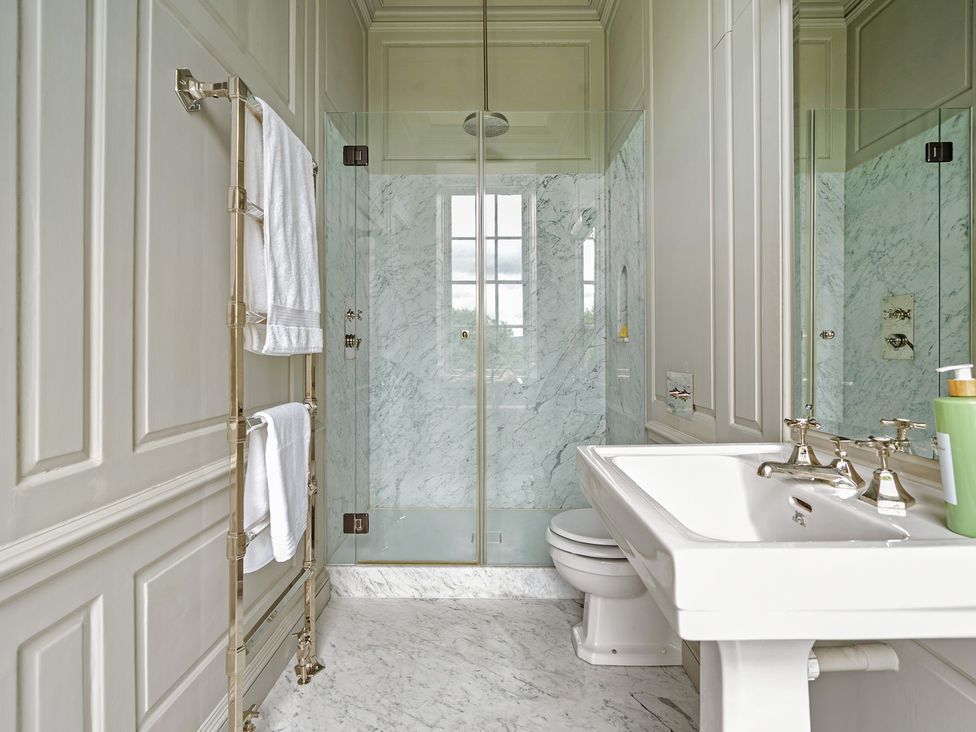 A bathroom with shower and sink at Batheaston House in Batheaston