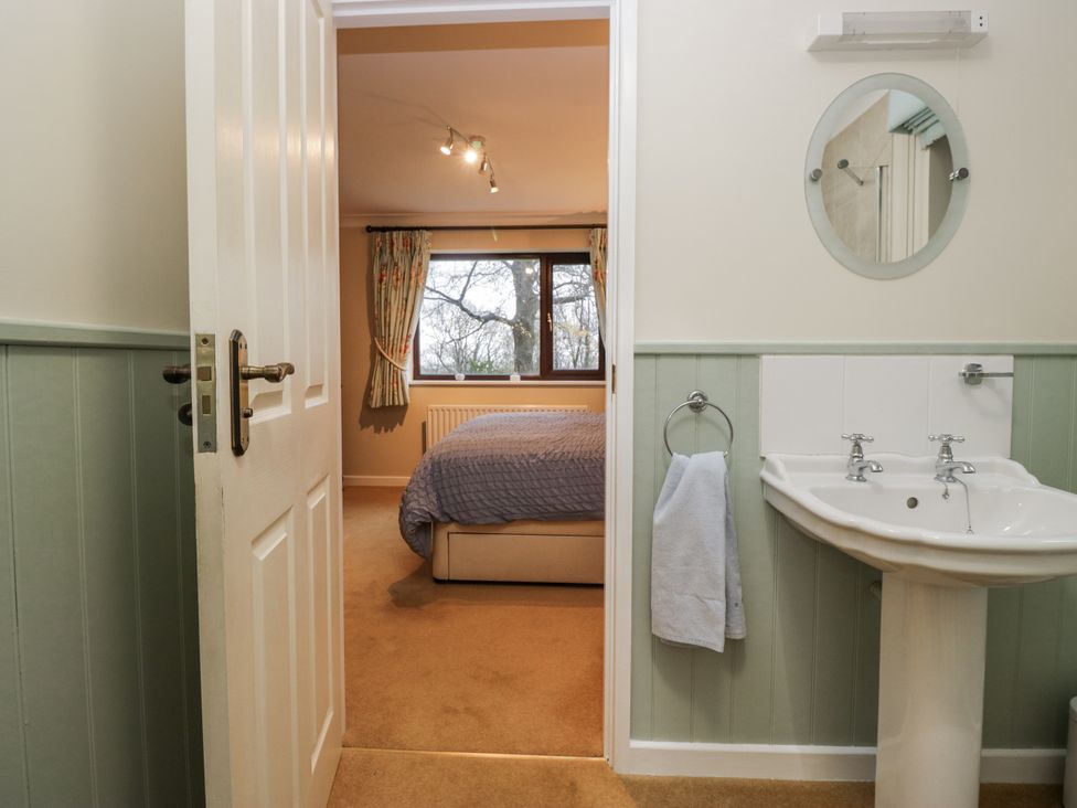A bathroom with a sink and towel at Beech Brae Kendal