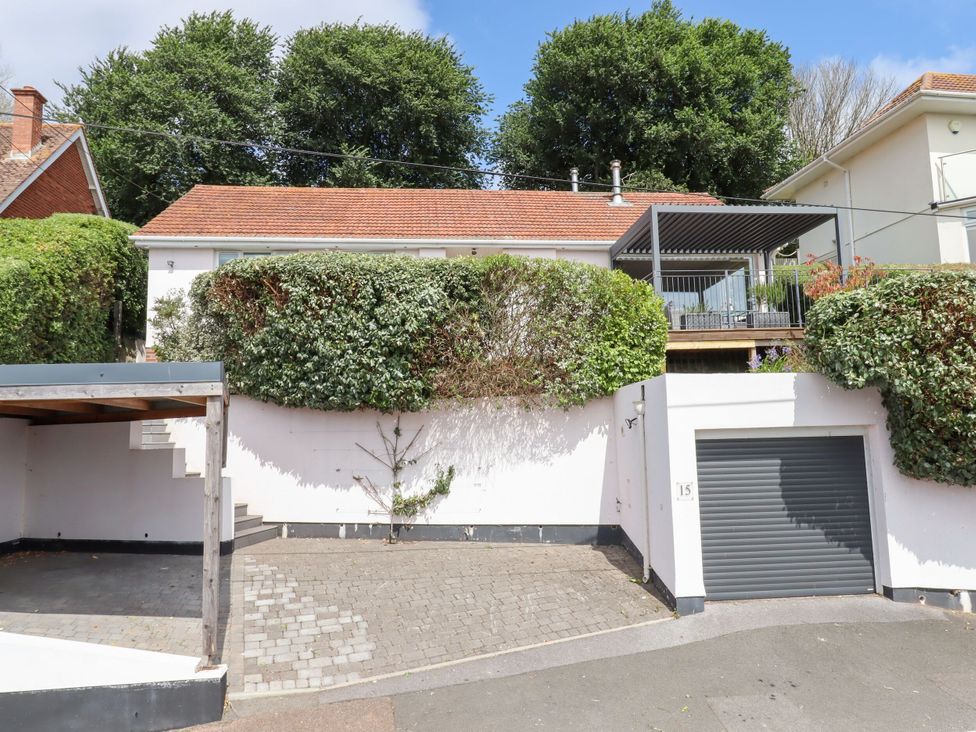 A house with a garage and deck at 15 Summerland Avenue Dawlish