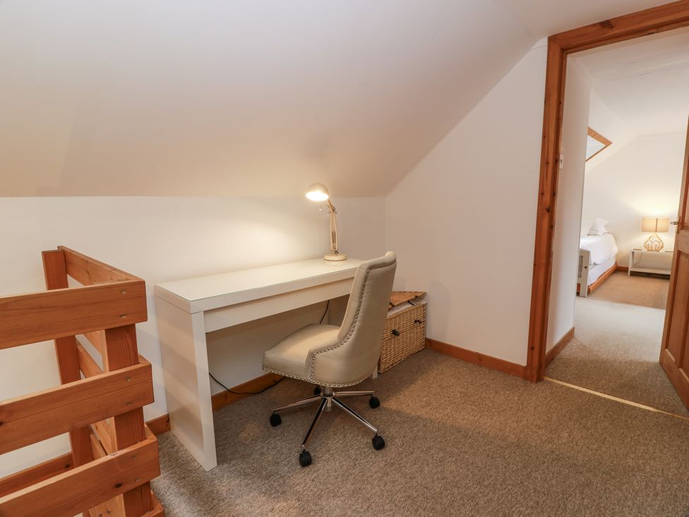A home office with a desk and chair at The Steading in Castle Douglas