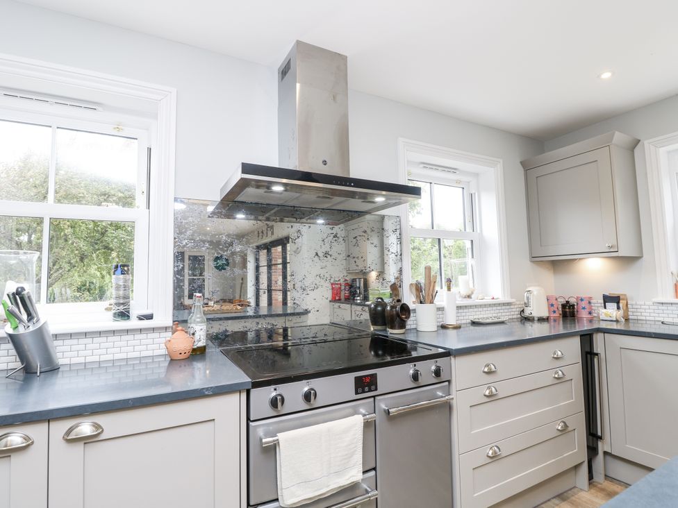 A kitchen with appliances and utensils at Milston in Chale
