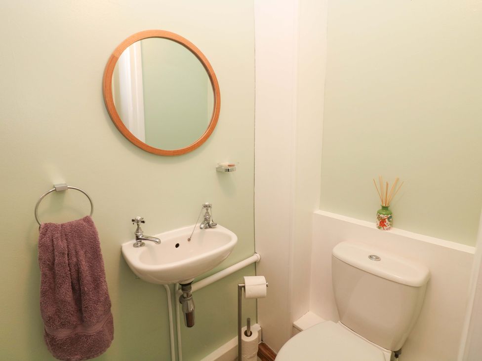 A bathroom with a sink and toilet at Little Thornsett