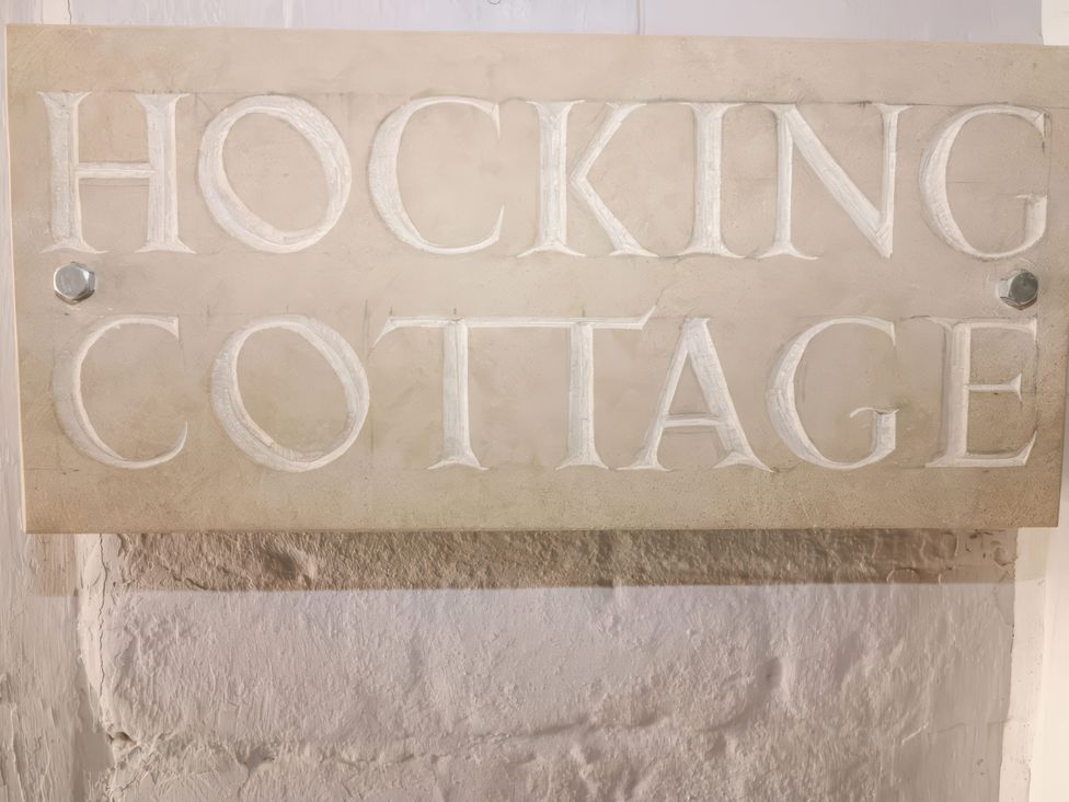 A plaque displaying the name Hocking Cottage