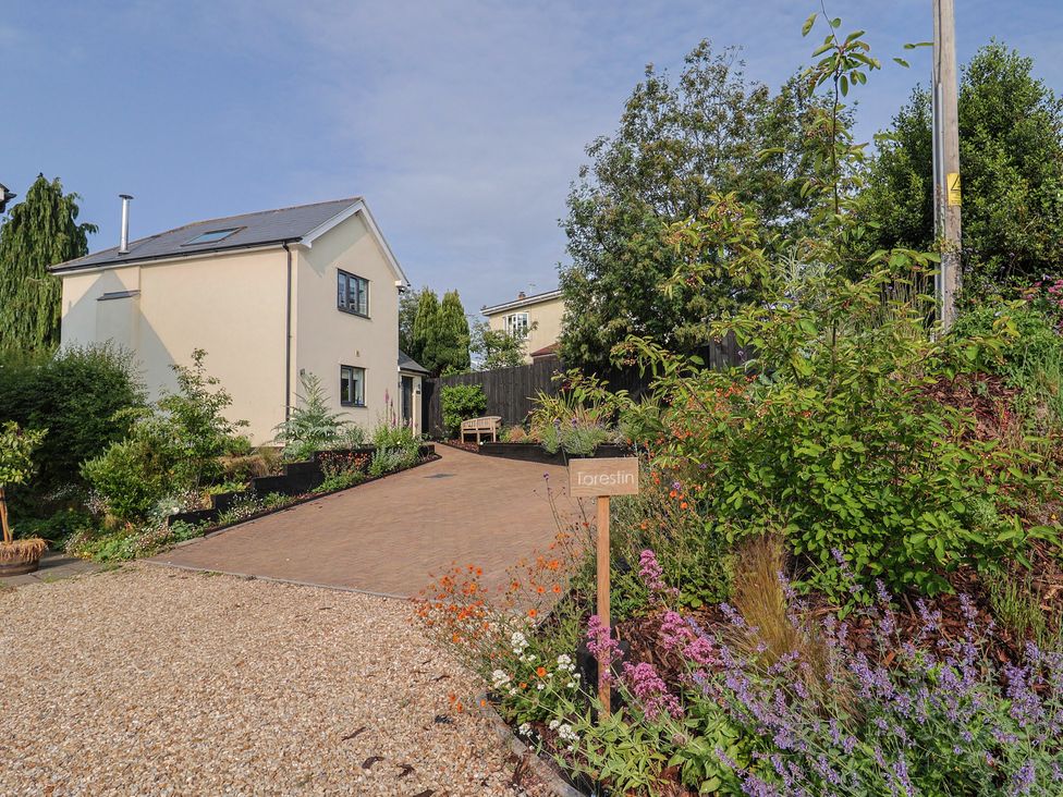A house with a garden and pathway at Torestin in Kilmington