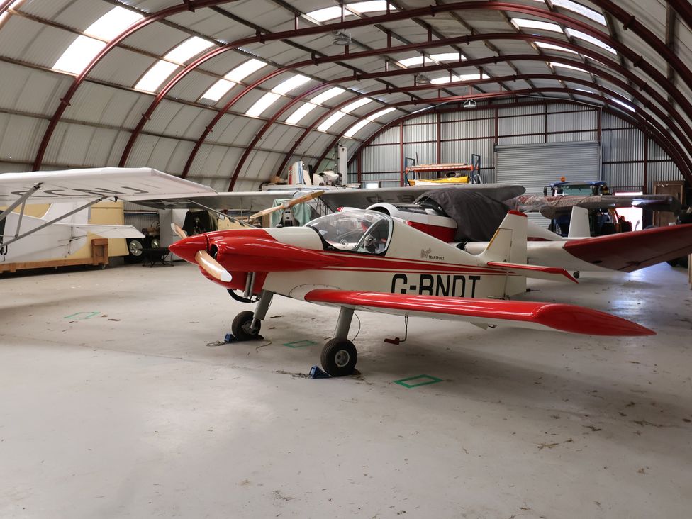 An airplane in a hangar at A-frame Monewden near Otley, Suffolk