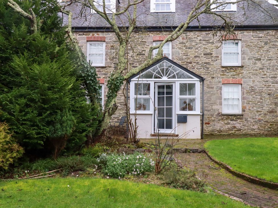 An exterior view of a house with a garden at Vosporth Villa in Newquay