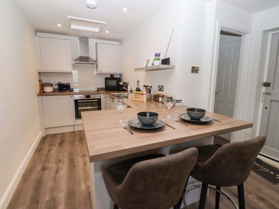 A kitchen with a dining area at North Sands in Beadnell