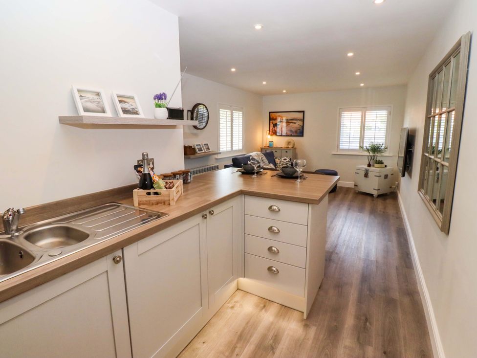 A kitchen with a countertop and sink at North Sands in Beadnell