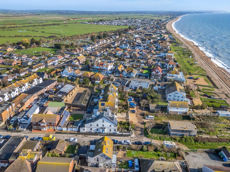 An aerial view of houses near beach at Marine House Pevensey Bay