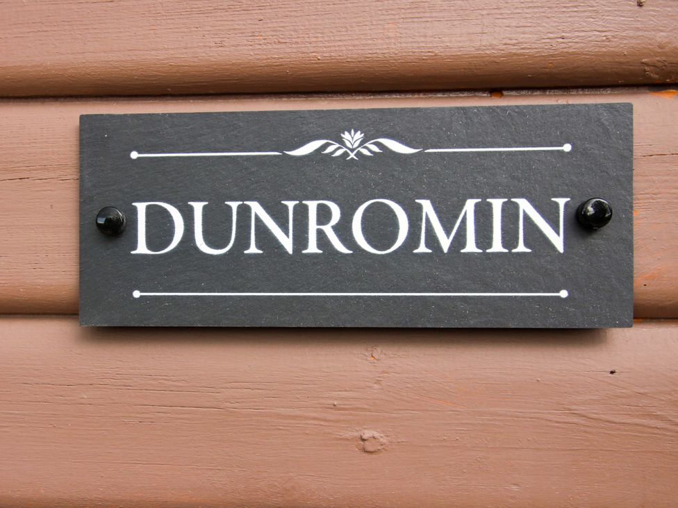 A nameplate displaying DUNROMIN at Dunromin in Montgomery