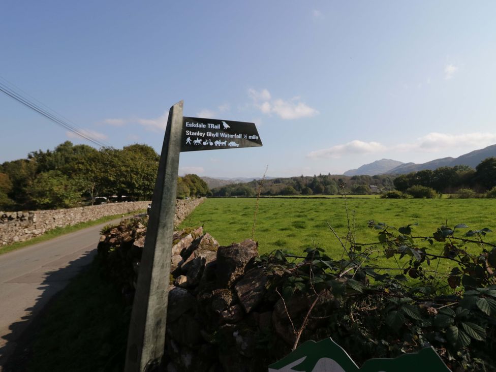 A signpost indicating trails and pathways at Dakota in Boot
