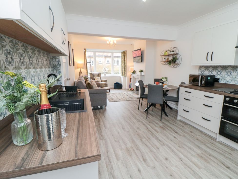 A kitchen with dining area and living space at The Old Chapel in Brompton-By-Sawdon