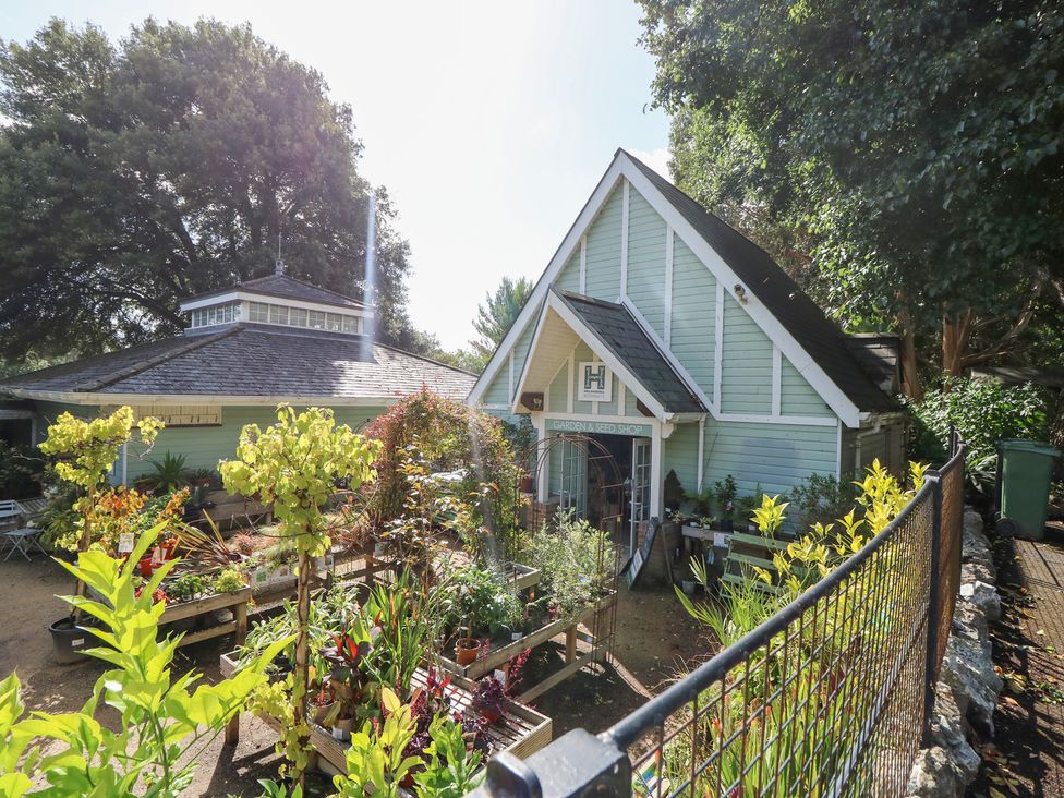 A garden shop with plants outside at Glebe Garth in Chale near Niton