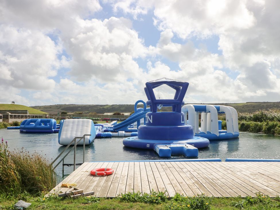 An inflatable water park with obstacle course at Glebe Garth Chale near Niton