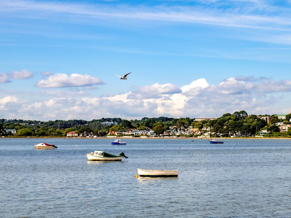 A view of boats in water with clouds in the sky at Seaheaven