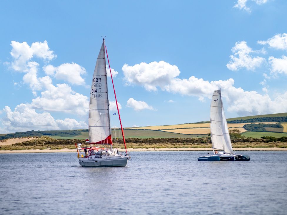 Sailboats on water with clouds in the sky at Seaheaven