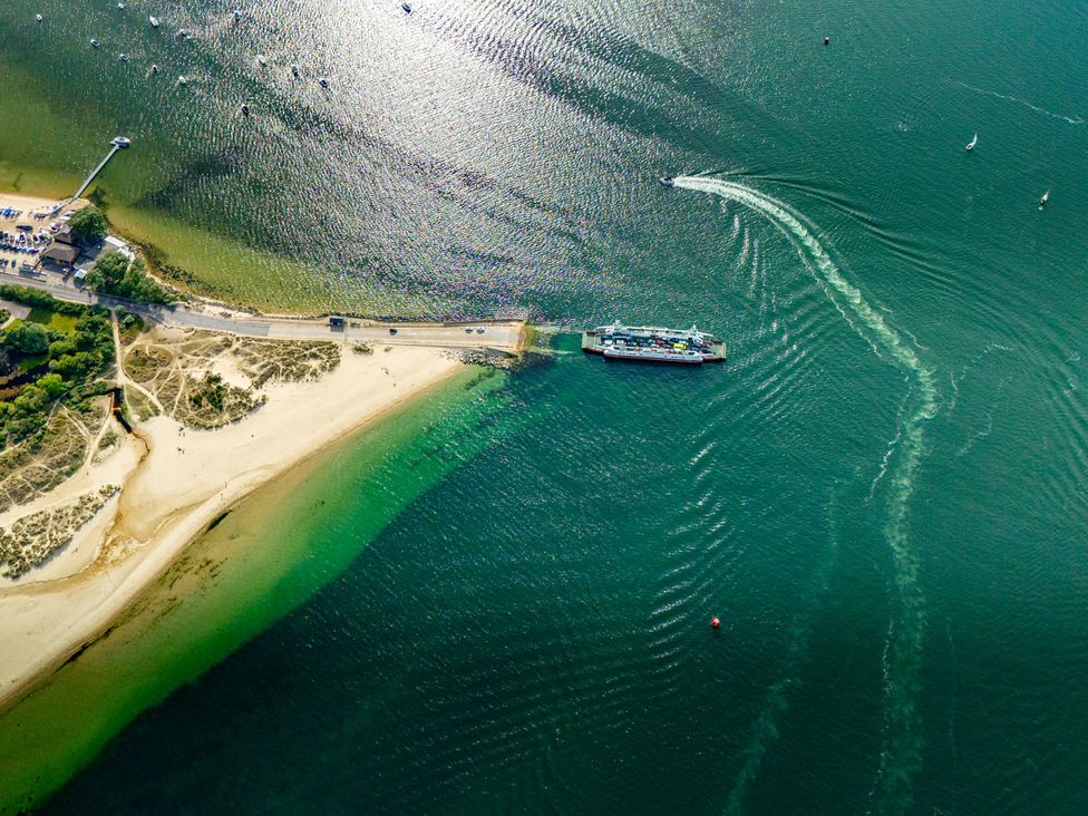 An aerial view of a boat near a shoreline at Seaheaven