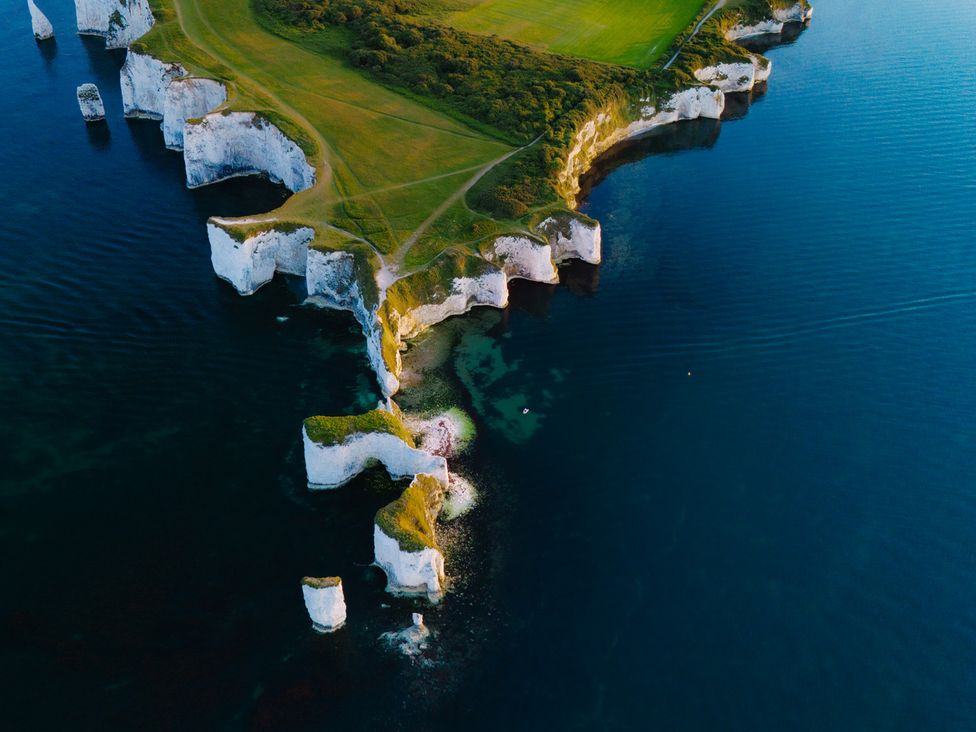 Aerial view of cliffs and water at Seaheaven 