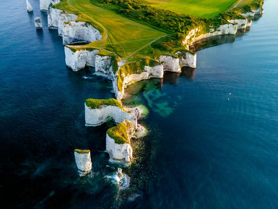 A coastal view of cliffs and ocean at Seaheaven