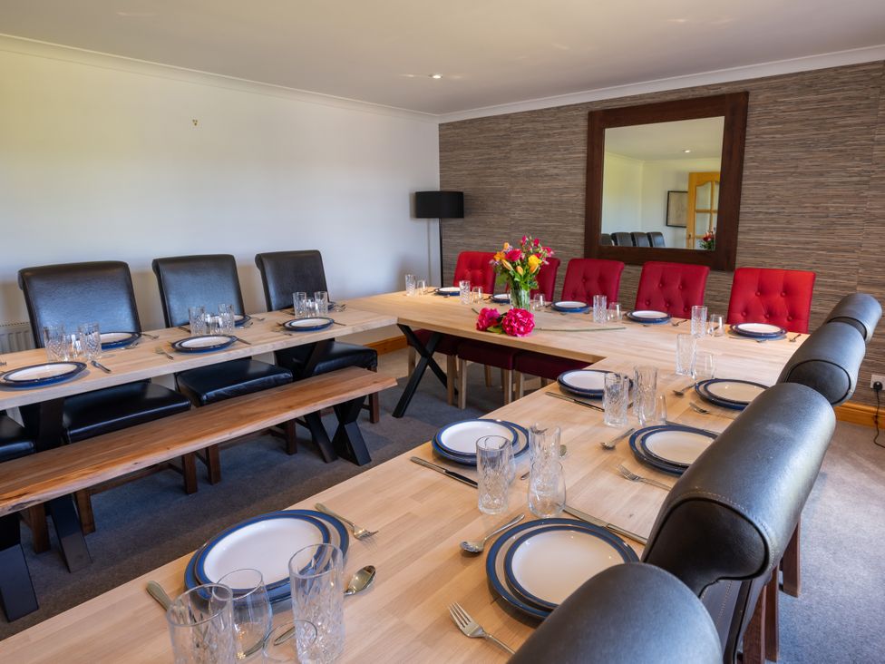 A dining room with a set table at Old Distillery Lodge