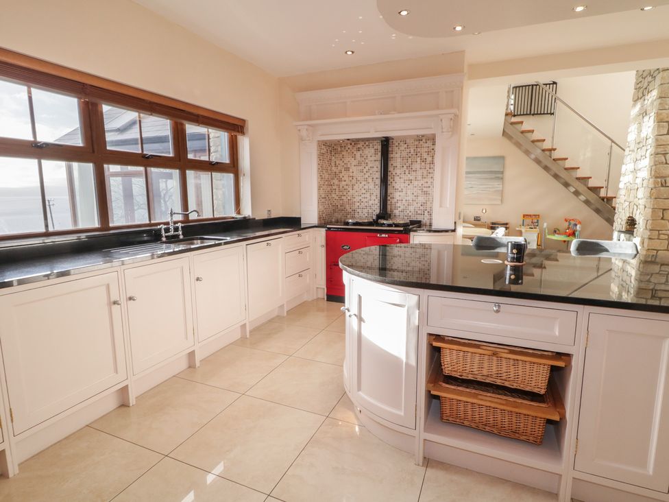 A kitchen with counter space and windows at Ard Na Mara in Drung near Quigley's Point, County Donegal