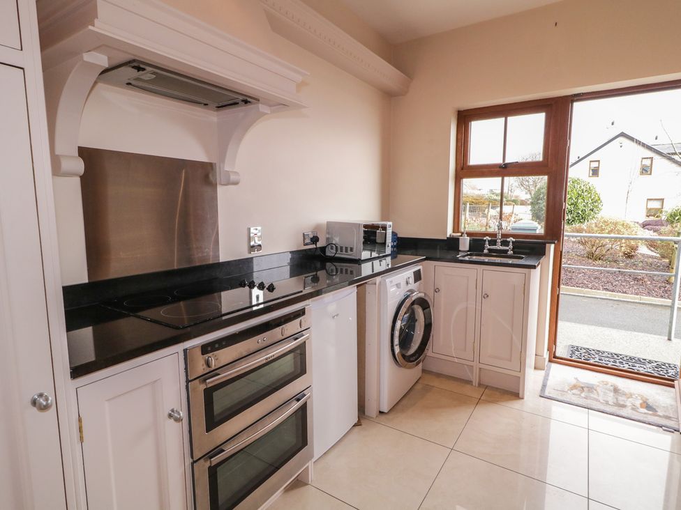 A kitchen with appliances and a countertop at Ard Na Mara Drung near Quigley's Point, County Donegal