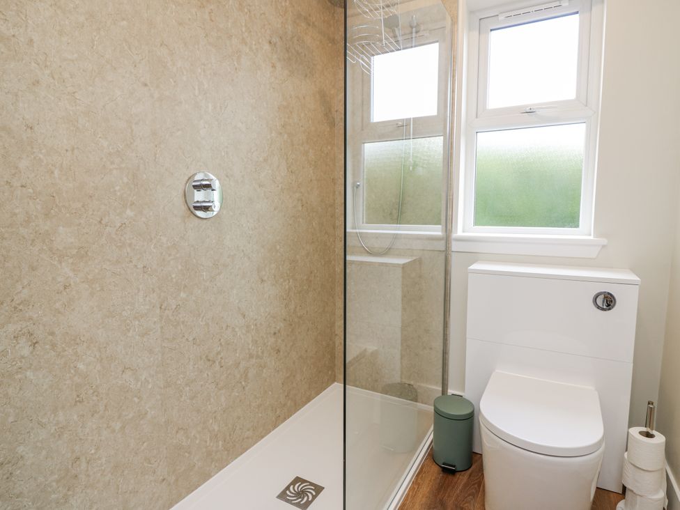A bathroom with a shower and toilet at Top Cottage, Cupar, Fife