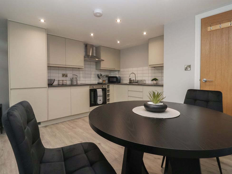 A kitchen with cabinets and countertop at Canal Side in Skipton