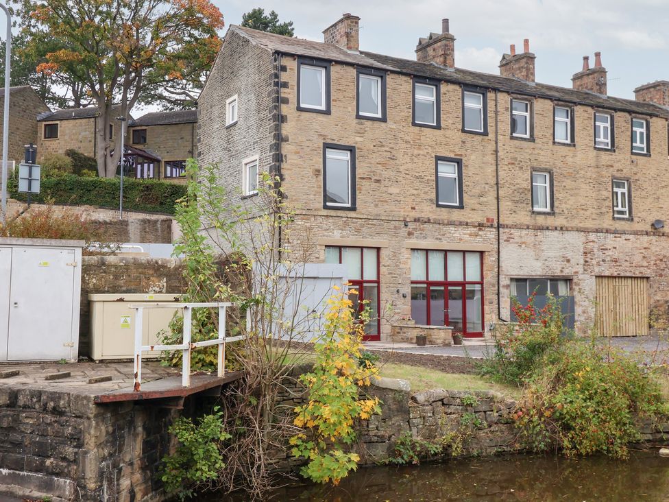 A building with windows and a garden at Waters Edge in Skipton