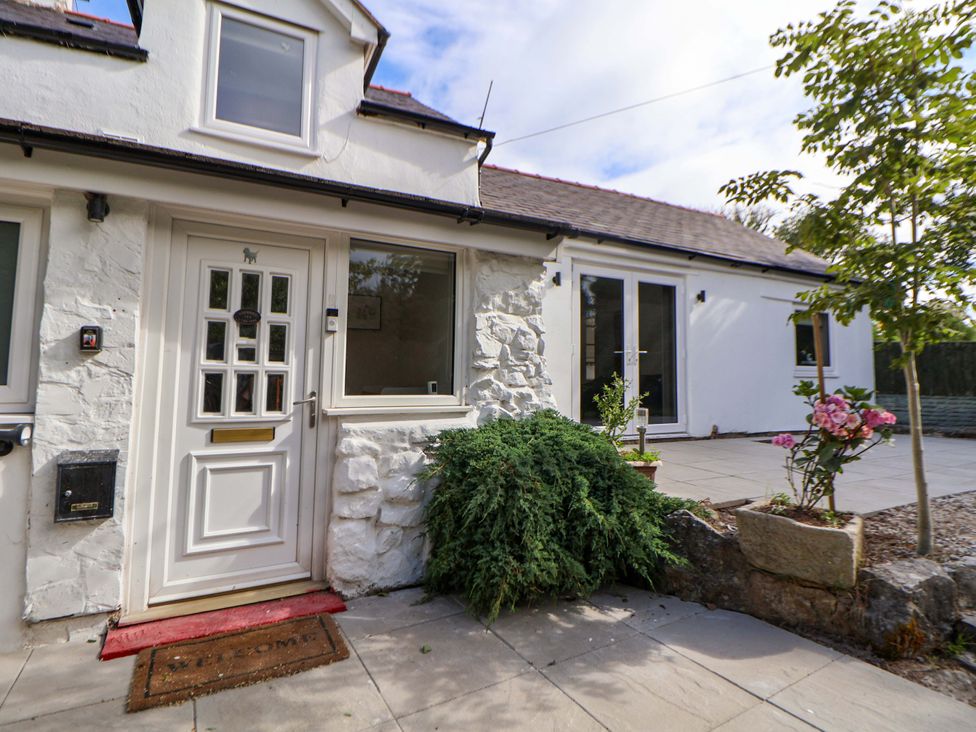 The entrance of a property with a front door and garden area at Cartref Pen Y Ball near Holywell