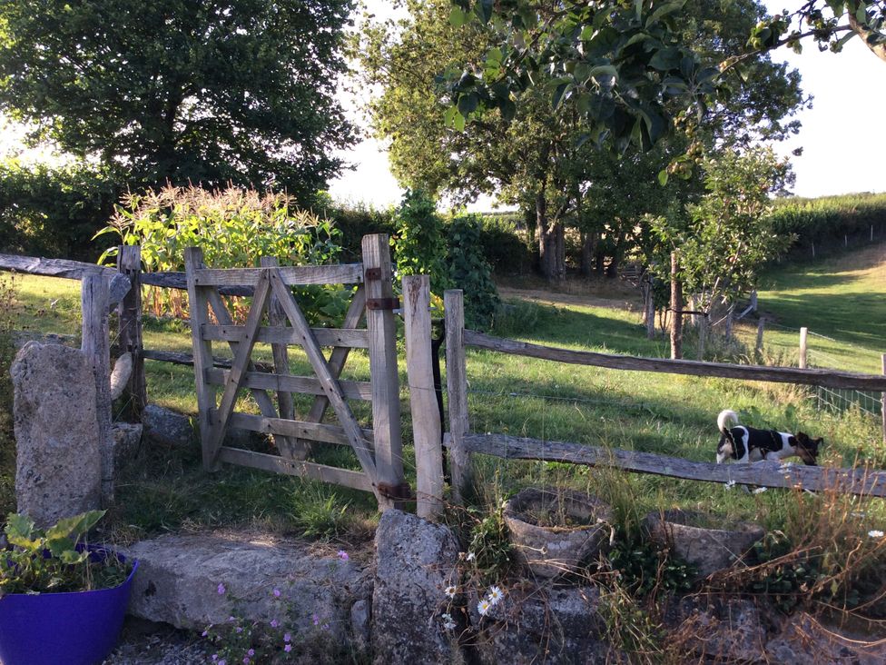 A gate and fence in a garden at Westacombe Farm Dunsford near Tedburn St Mary