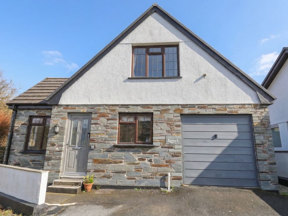 A house with stone exterior and garage at Kernyk in Camelford