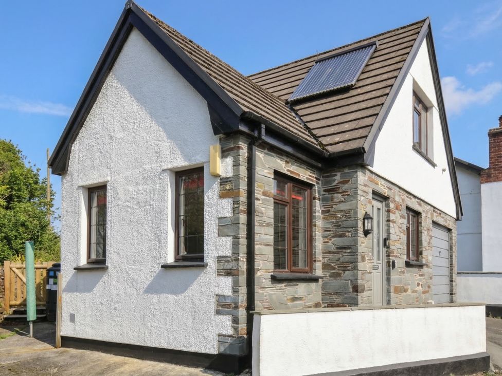 A house with a stone facade and solar panel at Kernyk in Camelford